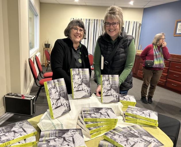 Cromwell Paperplus bookseller Linda Byron (left) sells Alexandra teacher Maria Affleck a copy of...