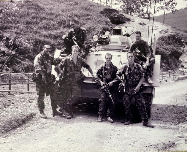 A group of New  Zealanders on patrol in Timor-Leste during a deployment more than two decades ago...