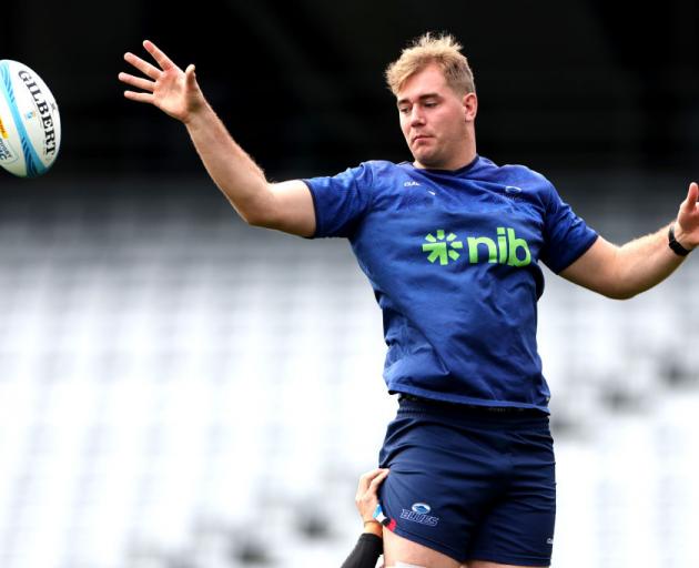 Blues lock Sam Darry leaps for a lineout takes during a training session. PHOTOS: GETTY IMAGES 