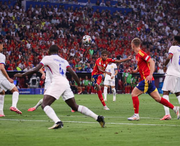 Spain's Lamine Yamal scored a stunning effort from outside the box to open the scoring for Spain....