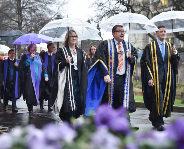 University of Otago staff mark a changing of the guard as (from left) pro-vice-chancellor Trish...