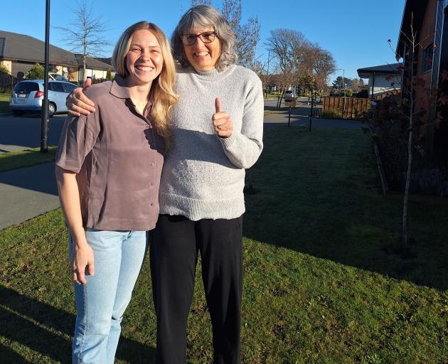 Former lifeguard Caitlain Gell (left) found Wilhelmina Theewis collapsed on this street corner....