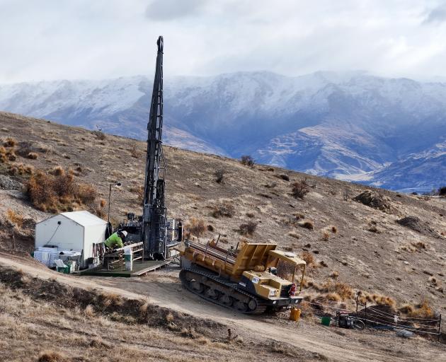 A drilling rig at the Rise and Shine deposit, atop the Rise and Shine ridge, as part of the...