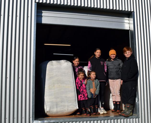 Going to work with their parents on a sheep and beef farm in Roxburgh are (from left) Karla...