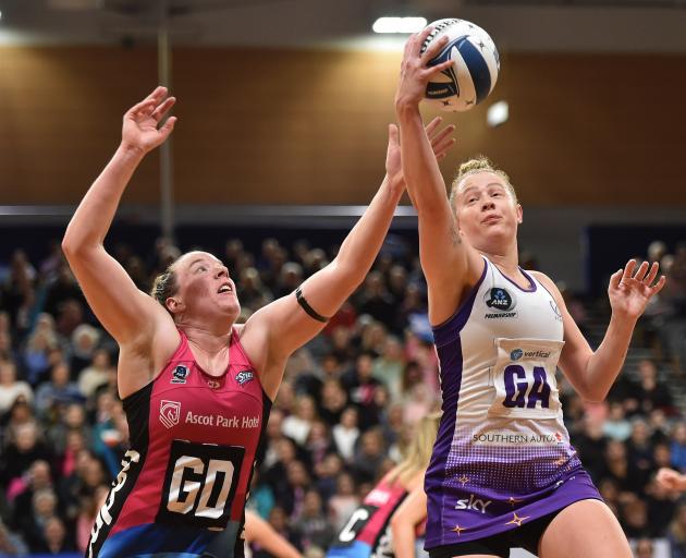 Steel defender Abby Lawson tries to steal the ball from Stars shooter Monica Falkner during their...