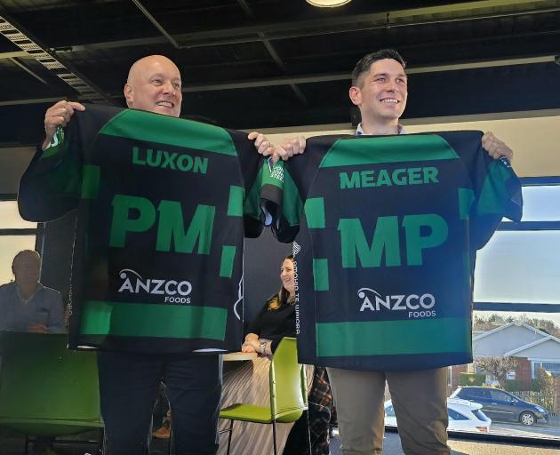 New Zealand Prime Minister Christopher Luxon (left) and Rangitata MP James Meager show off their...