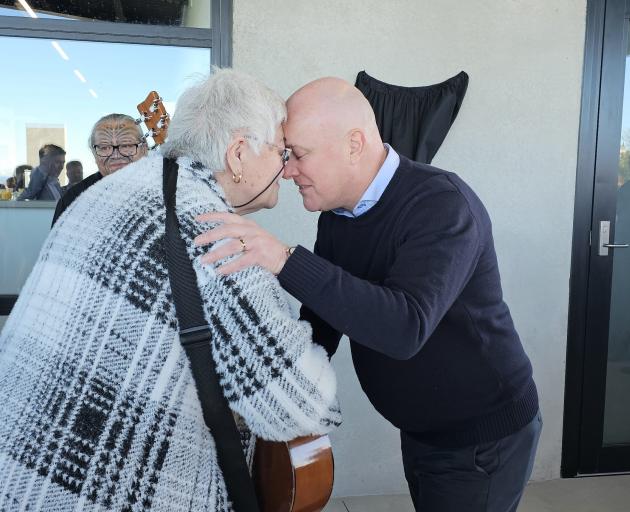 Ani Haua welcomes the prime minister to Fraser Park with a hongi. PHOTO: CONNOR HALEY