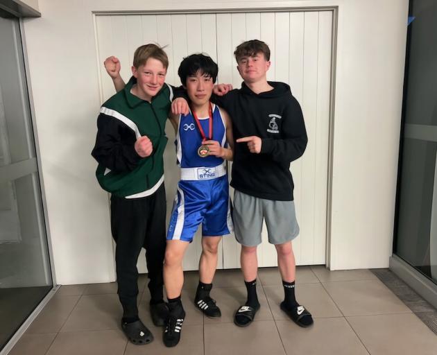 Celebrating their victories at the Canterbury Boxing Association tournament are (from left)...