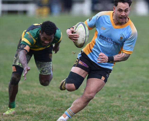 Varsity tears through the GI defence during last Saturday's bout. PHOTO: ODT FILES