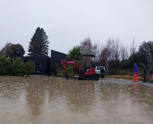 Flooding in Wānaka this morning was threatening six properties. PHOTO: REGAN HARRIS