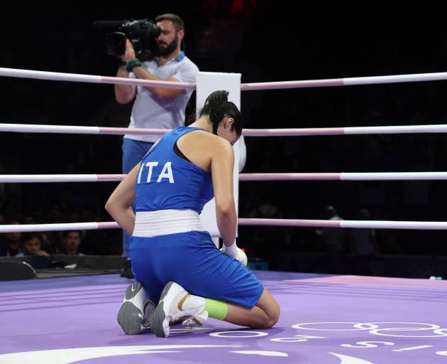 Angela Carini of Italy reacts after her fight against Imane Khelif of Algeria. Photo: Reuters