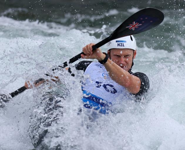 Butcher tackles the course during the canoe slalom men’s kayak single semifinal in Paris. PHOTO:...