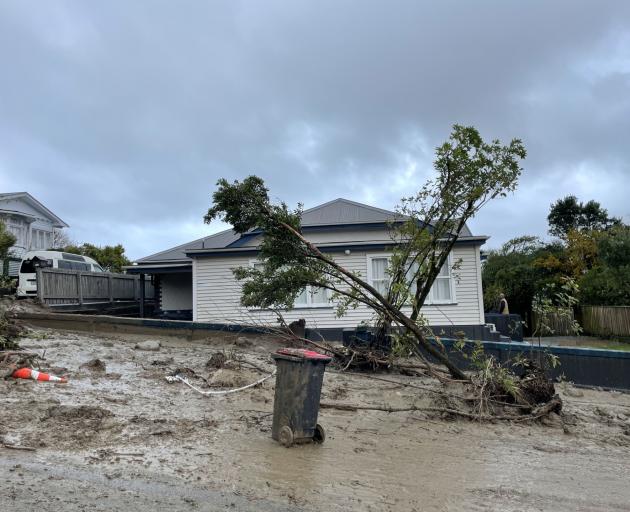 Milton Rd was covered in mud. Photo: Greymouth Star  