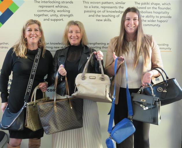 Members of the organising committee of Handbags and Gladrags 2024 include (from left) Gena...