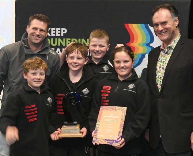 Dunedin Mayor Jules Radich (right) presents a Keep Dunedin Beautiful award to (from left)...