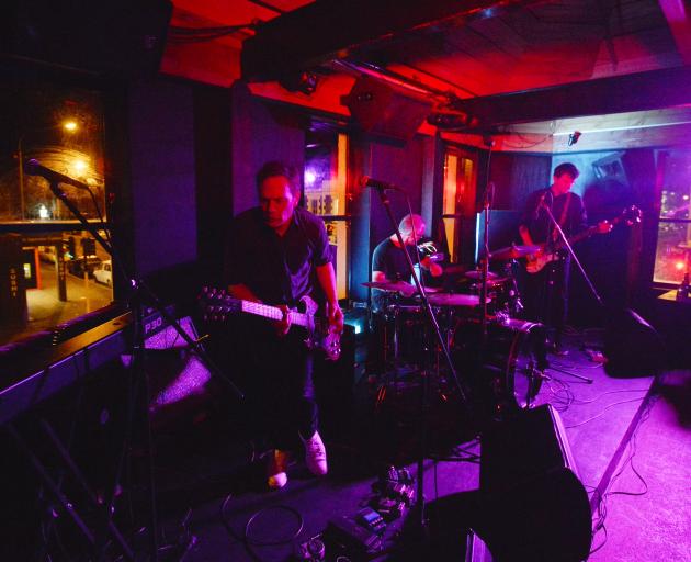 Lighting up a full house upstairs at the Captain Cook Tavern 2016 are (from left) Shayne P Carter...