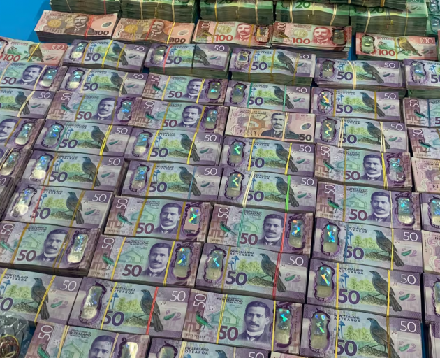 More than $1m cash was seized during an investigation into organised crime in 2021. Photo / NZ...