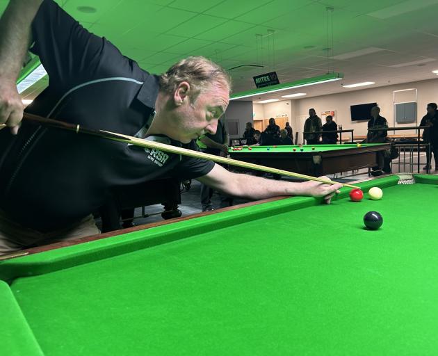 Evan Fricker, of Gore, lines up a shot at the snooker pairs tournament at the weekend. PHOTO: BEN...