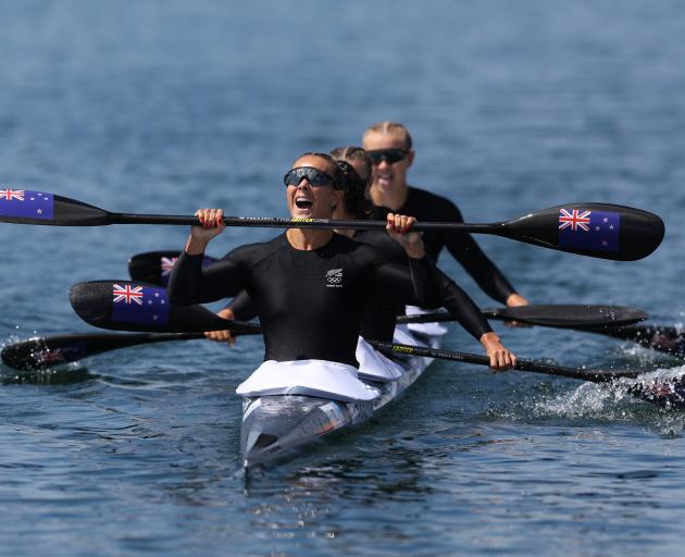 Lisa Carrington, Alicia Hoskin, Olivia Brett and Tara Vaughan celebrate their gold in the K4 500m...