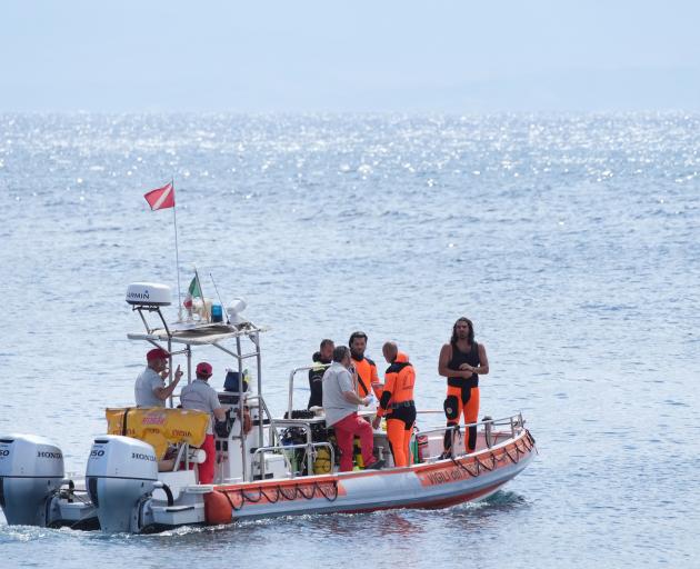 Italian emergency services headed out to sea towards the area off the Sicilian coast on Tuesday,...