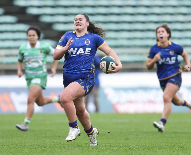 Otago Spirit outside back Te Atawhai Campbell charges to a try during the Farah Palmer Cup game...