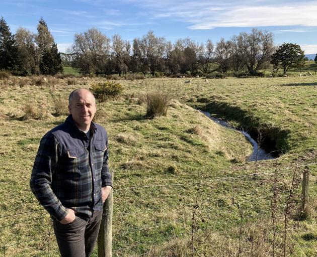 Pomahaka Water Care Group co-ordinator Craig Simpson wants to transform this paddock on the edge...