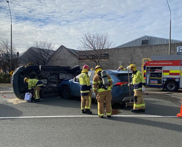 Emergency services at the scene of the crash. Photo: Craig Baxter