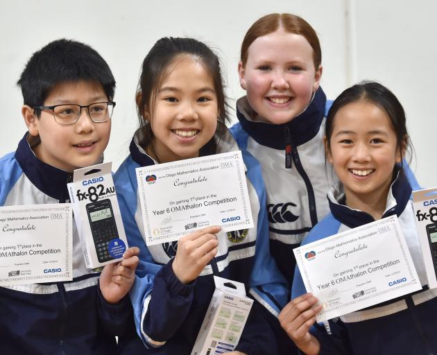 The 2024 year 6 O’Mathalon winners George Street Normal pupils (from left) Alex Lai, 11, Kaitlyn...