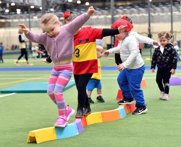 Preschool athletes (from left) Charlotte Guest, Margot Carruthers, Patrick Hawkins and Grace...