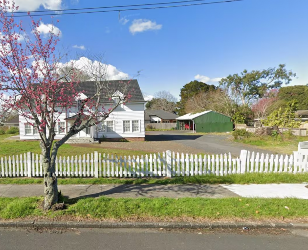 225 St George St, Papatoetoe, in August 2022. The Norfolk pine was to the right of the driveway...