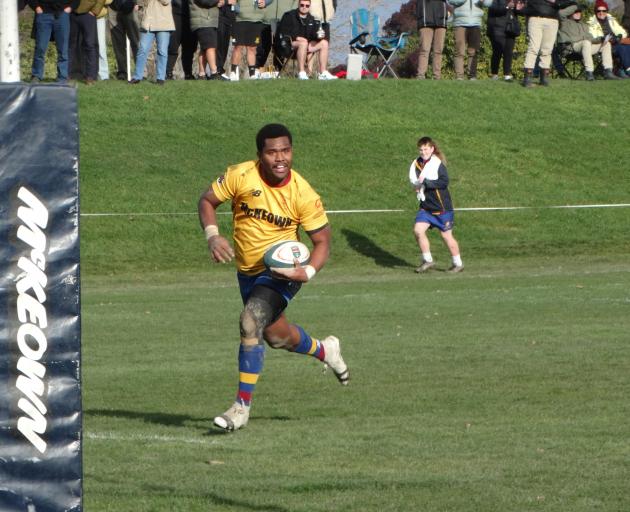 North Otago winger Seva Druma speeds towards the try line against Horowhenua-Kapiti in Oamaru on...