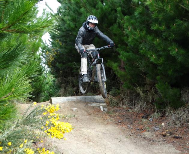 Paul Buckley, of South Canterbury, hits a jump during Mountain Biking North Otago’s Funduro event...