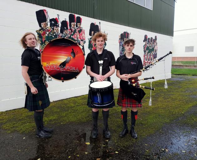 Invercargill Pipe Band members (from left) bass drummer Cameron Fraser, snare drummer Peter...