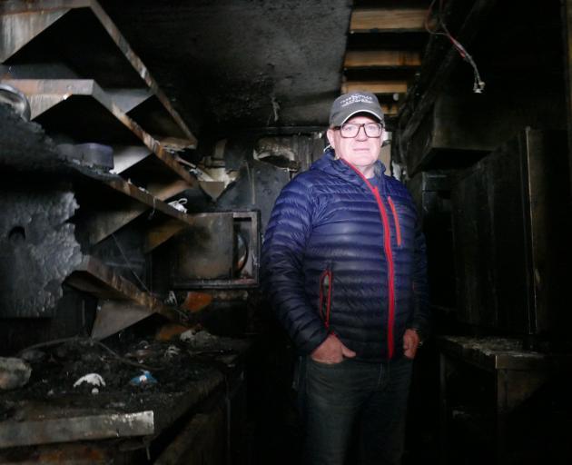 Speight’s Ale House Queenstown owner Clark Frew in his devastated building, after a fire ravaged...