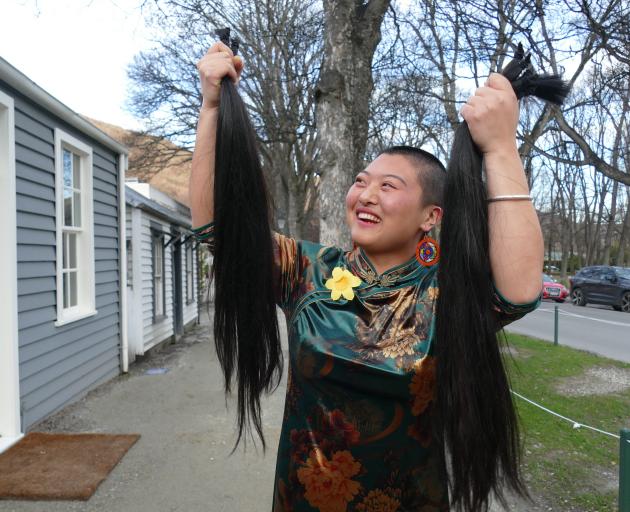 Arrowtown Preschool teacher Mercy Liu pictured after shaving off 93cm of her hair at Arrowtown’s...