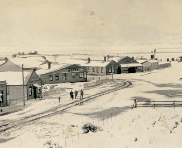 Ranfurly under snow in the 1920s with Donald’s private hotel and butcher’s shop buildings to the...