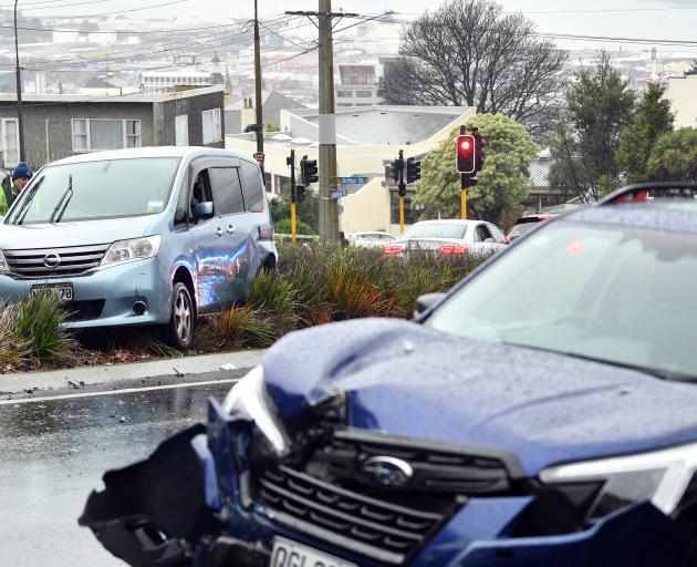 Emergency services at the scene of a two-car crash in Rattray St, Dunedin. PHOTO: STEPHEN JAQUIERY