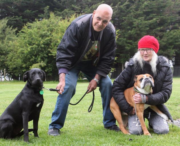 In 2022, Trev Cameron and Invercargill resident Lizzy Curry, pictured with their rescue dogs...