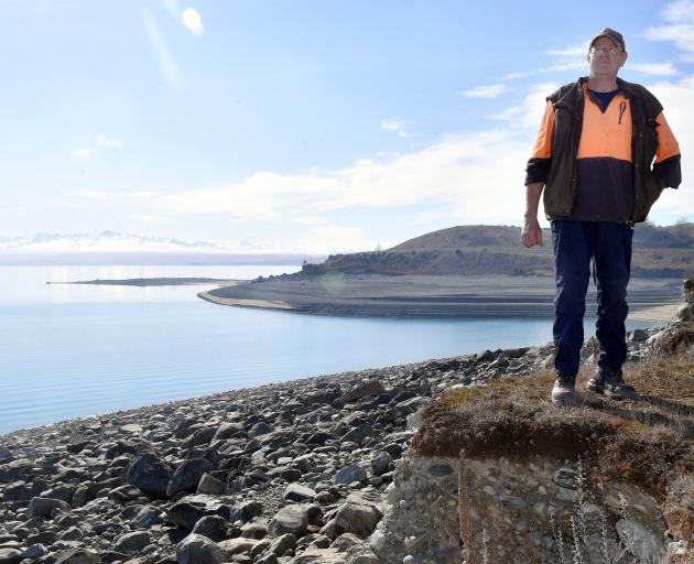 Mackenzie district councillor Scott Aronsen is concerned Lake Pūkaki is so low. PHOTO: STEPHEN...