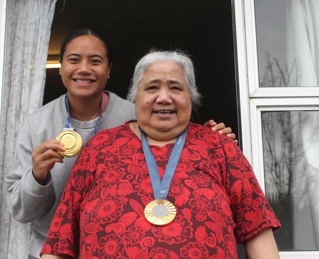 Southland’s first double Olympian Alena Saili and her nana Selesa Ahfook wear the medals at home...