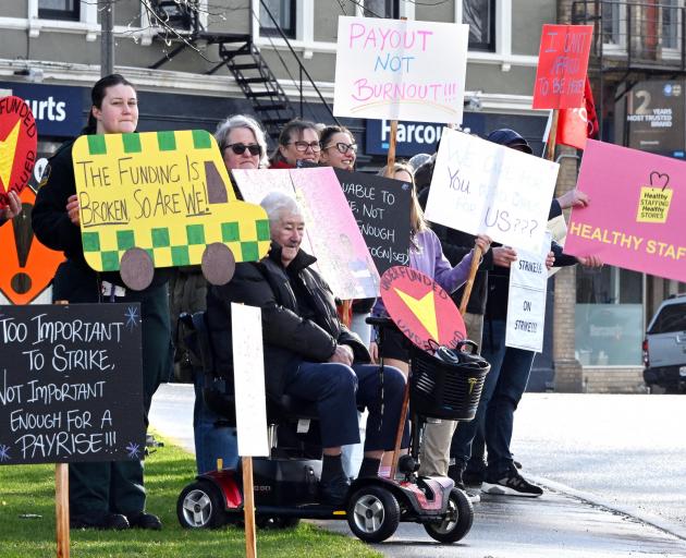 Hato Hone St John paramedics picket at Queens Gardens in Dunedin on Saturday morning. PHOTO:...