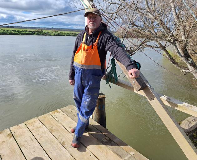 Terry Osborne at his whitebait stand in Seaward Downs, readying himself for the start of the...