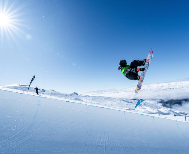 Campbell Melville Ives shows his class during the snowboard halfpipe at the Winter Games event at...