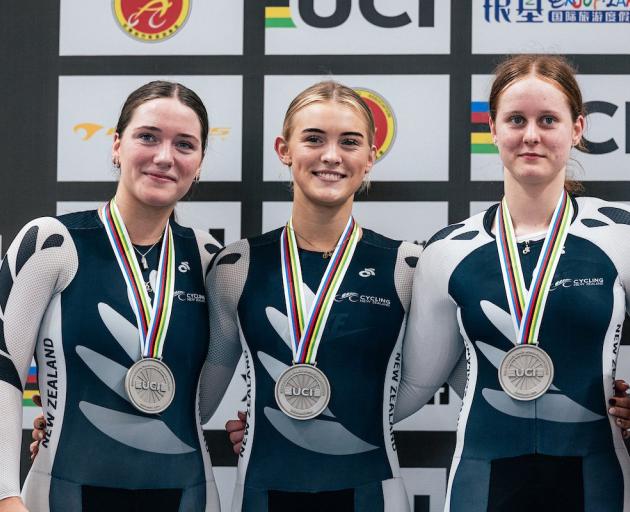 New Zealand riders (from left) Riley Faulkner, Jodie Blackwood and Caitlin Kelly receive their...