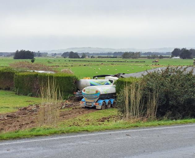 The truck crashed into a house after colliding with a car on State Highway 1 at Edendale. Photo:...