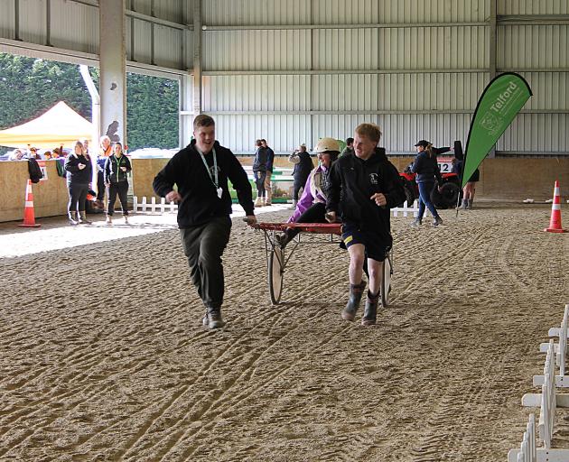 South Otago High School students Liam Wilson, 15, (left) and Finn Gilder, 17, use teamwork as...