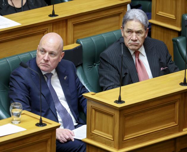 Christopher Luxon and Winston Peters in Parliament’s debating chamber. PHOTO: GETTY IMAGES