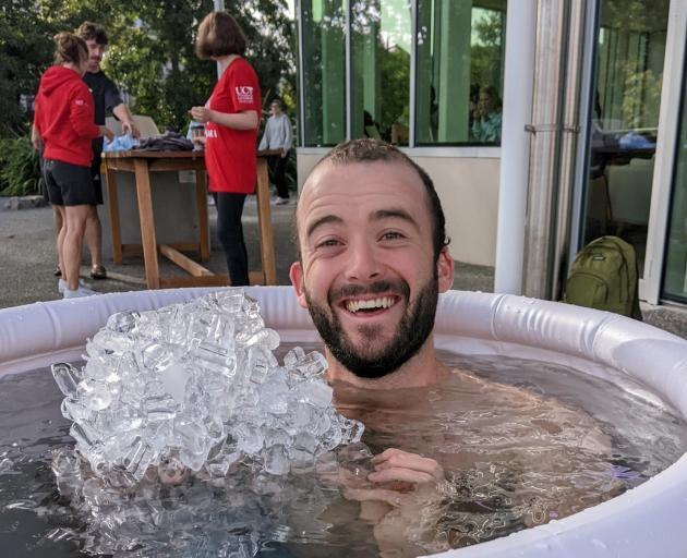 Psychology student Eliot Mckelvey taking an ice bath as part of a practical approach to well...