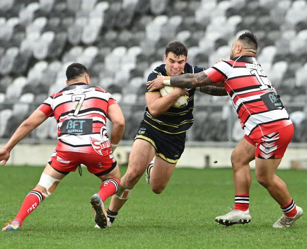 Otago lock Hagen Free charges the ball up field as the Counties-Manukau defence of Arthur...