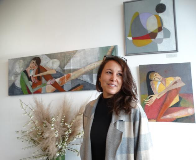 Artist Aimy Chin in front of her artwork in her pop-up shop. PHOTOS: JULES CHIN